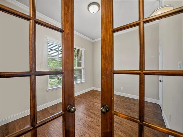 an empty room with windows