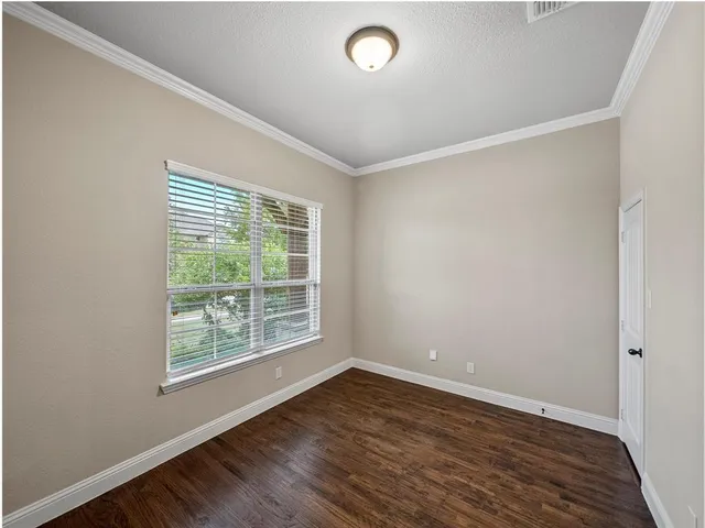a bathroom with a sink toilet and mirror