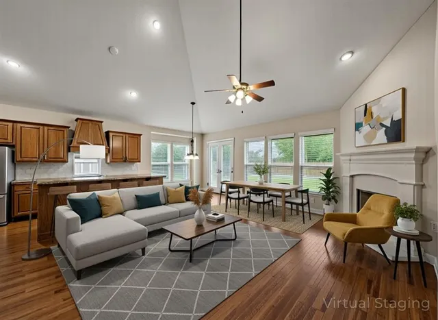 a view of kitchen with granite countertop cabinets and wooden floor