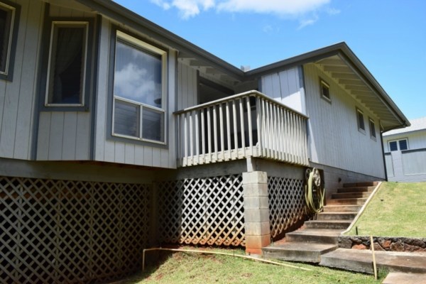 4790 Pelehu Road Kapaa, HI 96746 - Photo 12 of 17 a front view of a house with wooden fence