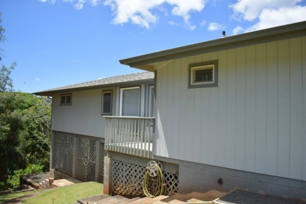 4790 Pelehu Road Kapaa, HI 96746 - Photo 13 of 17 a front view of a house with a yard