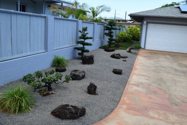 4790 Pelehu Road Kapaa, HI 96746 - Photo 16 of 17 a backyard of a house with lots of green space