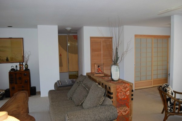 4790 Pelehu Road Kapaa, HI 96746 - Photo 3 of 17 a living room with furniture and a flat screen tv