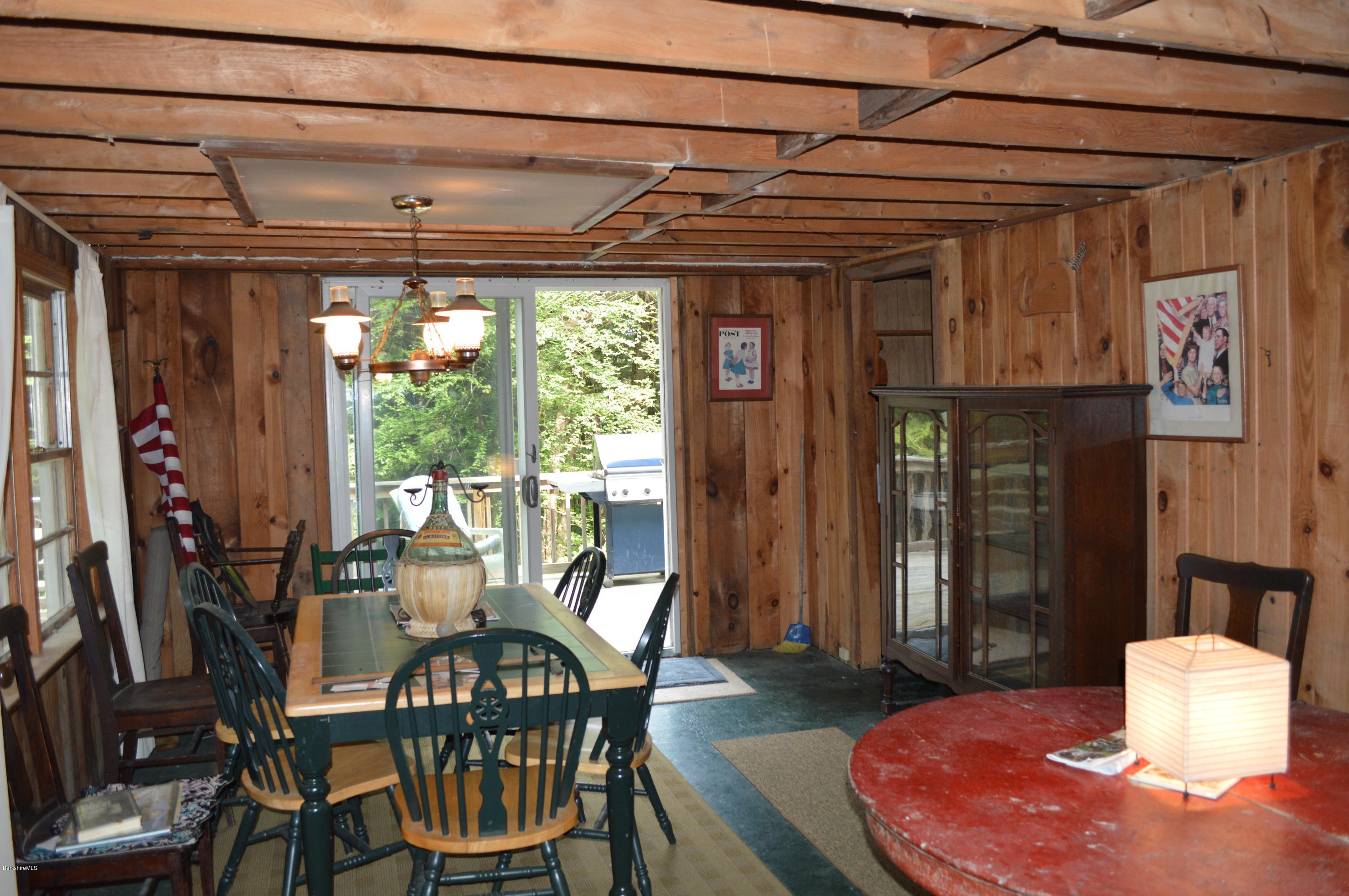 34 Highland Road Becket, MA 01223 - Photo 11 of 35 a view of a dining room with furniture window and outside view