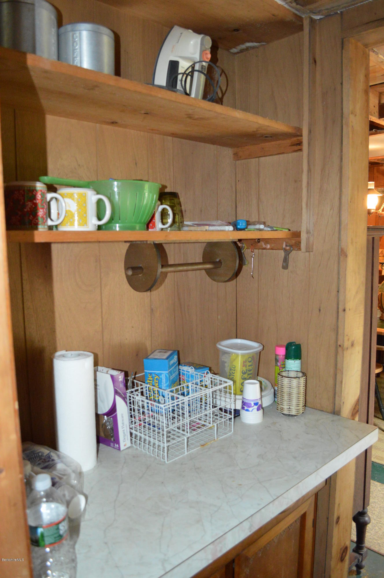 34 Highland Road Becket, MA 01223 - Photo 20 of 35 a kitchen with a refrigerator a sink and cabinets