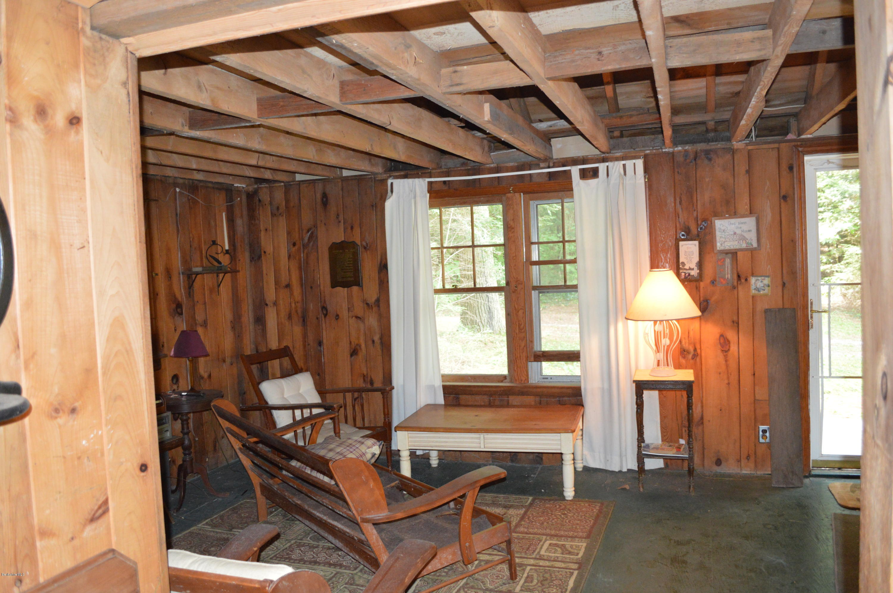 34 Highland Road Becket, MA 01223 - Photo 29 of 35 a room with table and windows