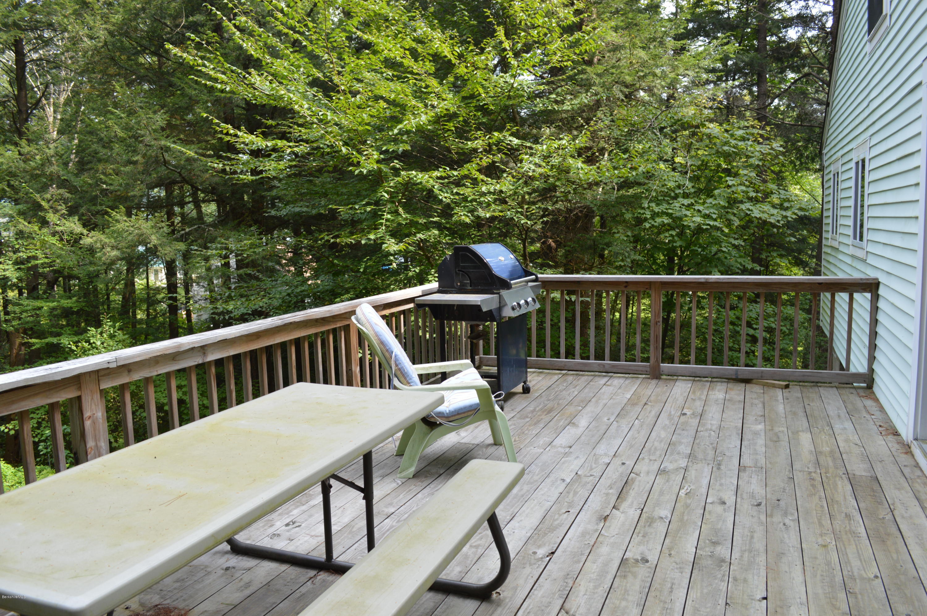 34 Highland Road Becket, MA 01223 - Photo 30 of 35 a view of balcony with furniture and wooden floor