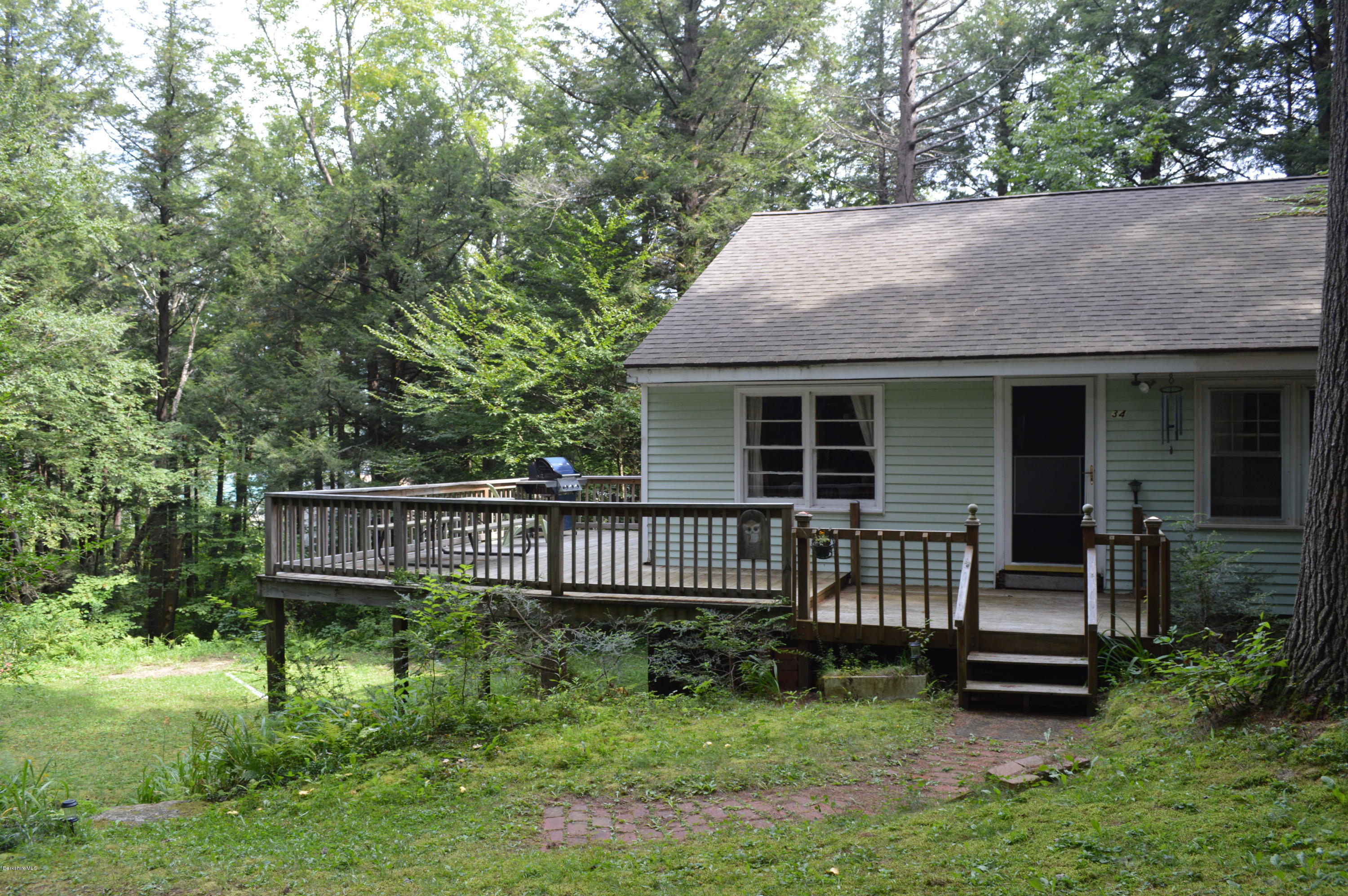 34 Highland Road Becket, MA 01223 - Photo 9 of 35 a house view with a garden space