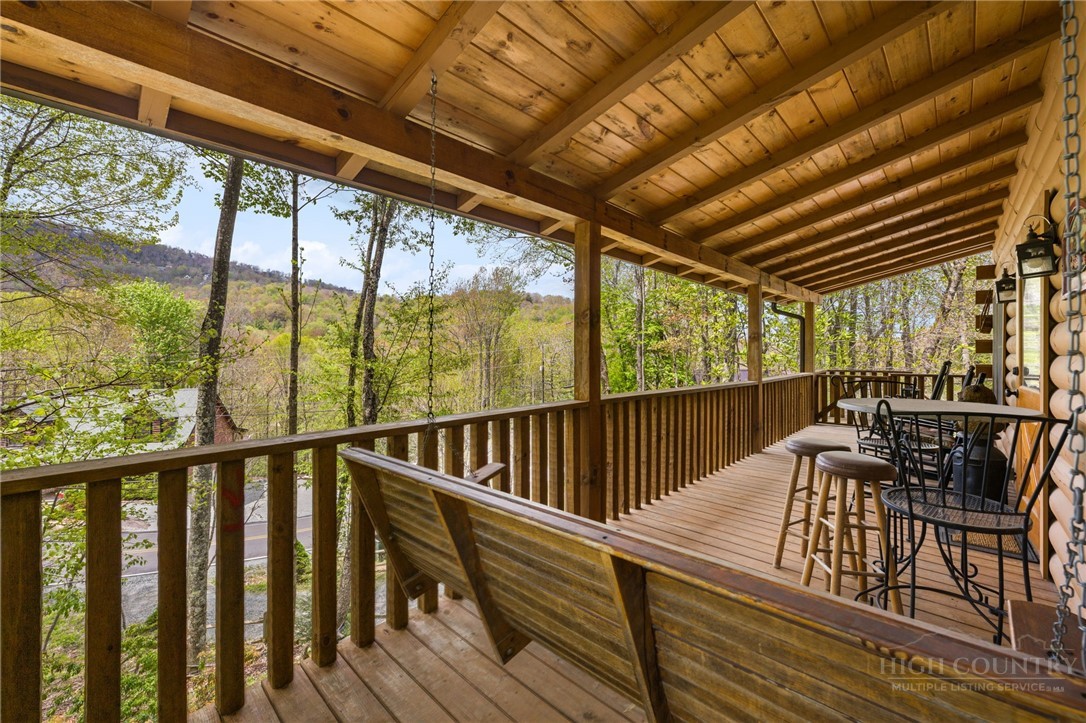 259 Greenbriar Road Beech Mountain, NC 28604 - Photo 3 of 41 a view of balcony with chairs