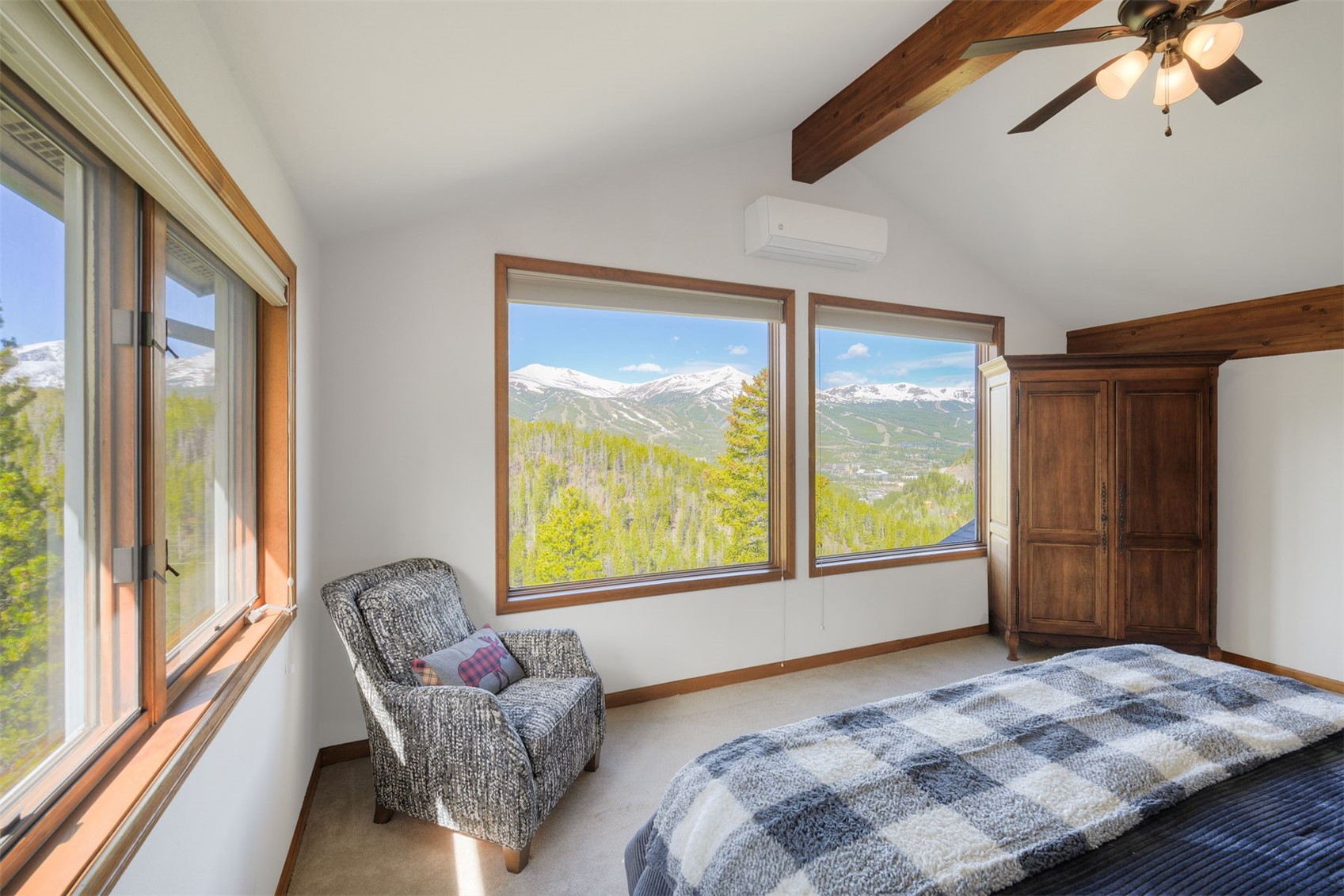 2542 Boreas Pass Road Breckenridge, CO 80424 - Photo 18 of 33 a bedroom with a bed and glass windows