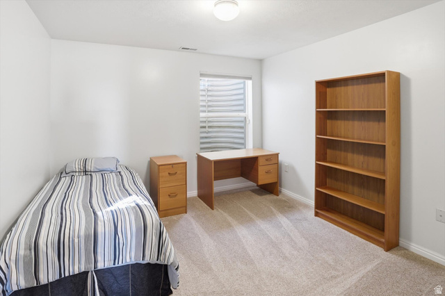 14820 175 East Draper, UT 84020 - Photo 28 of 39 Bedroom featuring light colored carpet and baseboards