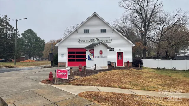 a view of a street with cars