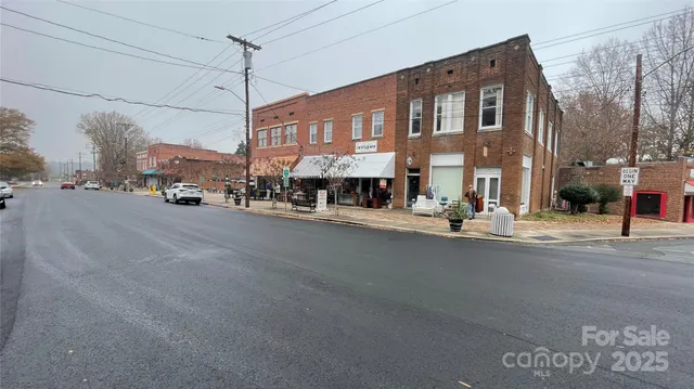 a view of a street with a building in front of it
