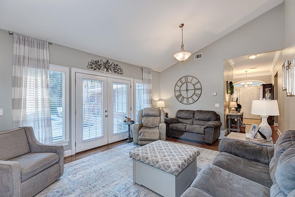 2008 Stark Avenue Columbus, GA 31906 - Photo 12 of 32 a living room with furniture a large window and a clock