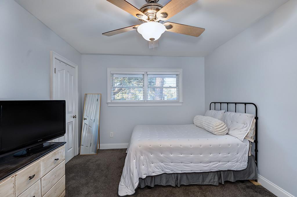 2008 Stark Avenue Columbus, GA 31906 - Photo 18 of 32 a bedroom with a bed and a flat screen tv