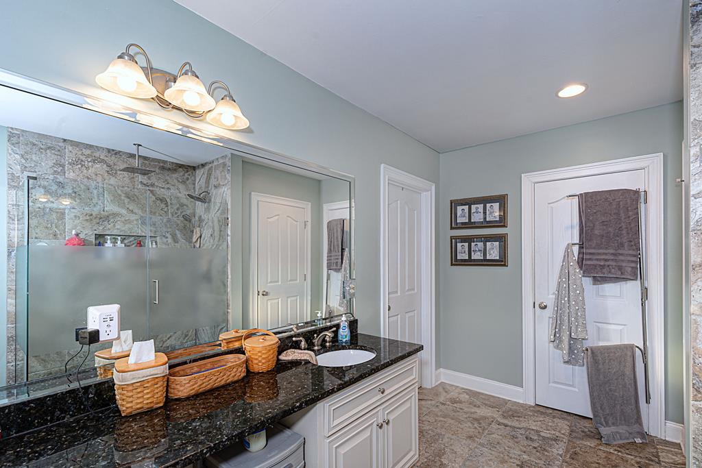 2008 Stark Avenue Columbus, GA 31906 - Photo 28 of 32 a living room with furniture and a chandelier