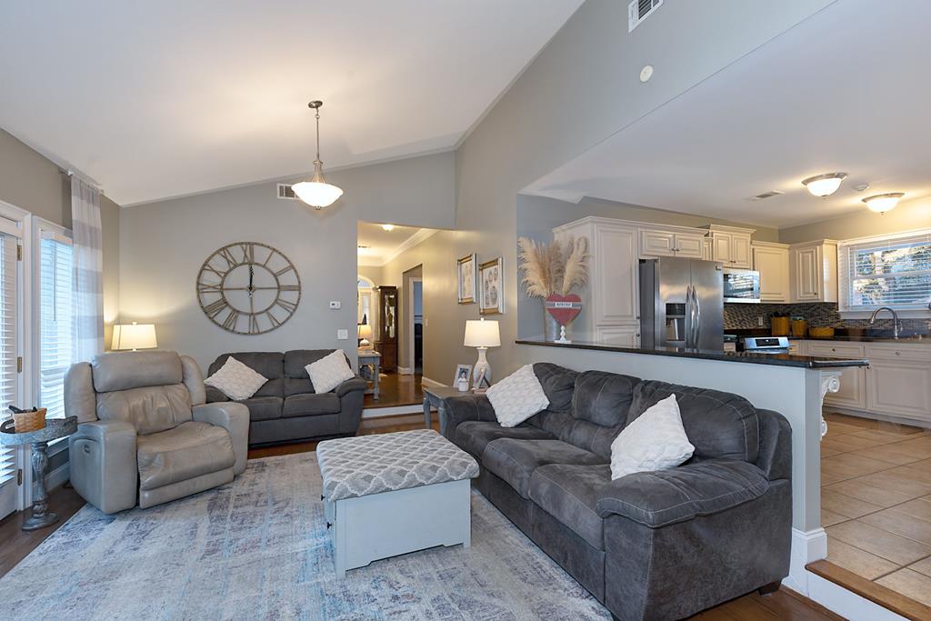 2008 Stark Avenue Columbus, GA 31906 - Photo 10 of 32 a living room with furniture a clock and a large mirror