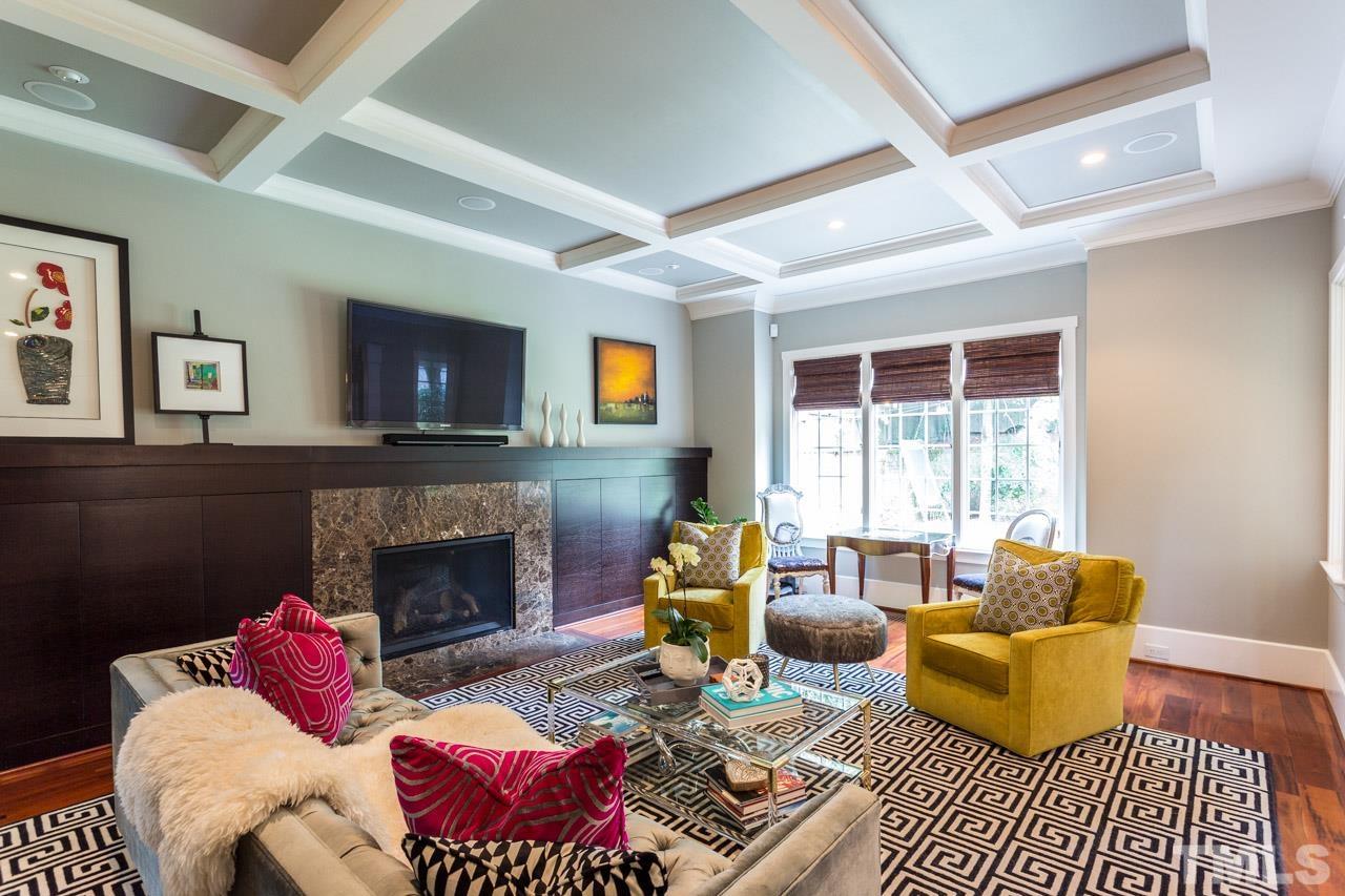 910 West Johnson Street Raleigh, NC 27605 - Photo 12 of 30 a living room with furniture fireplace and a flat screen tv