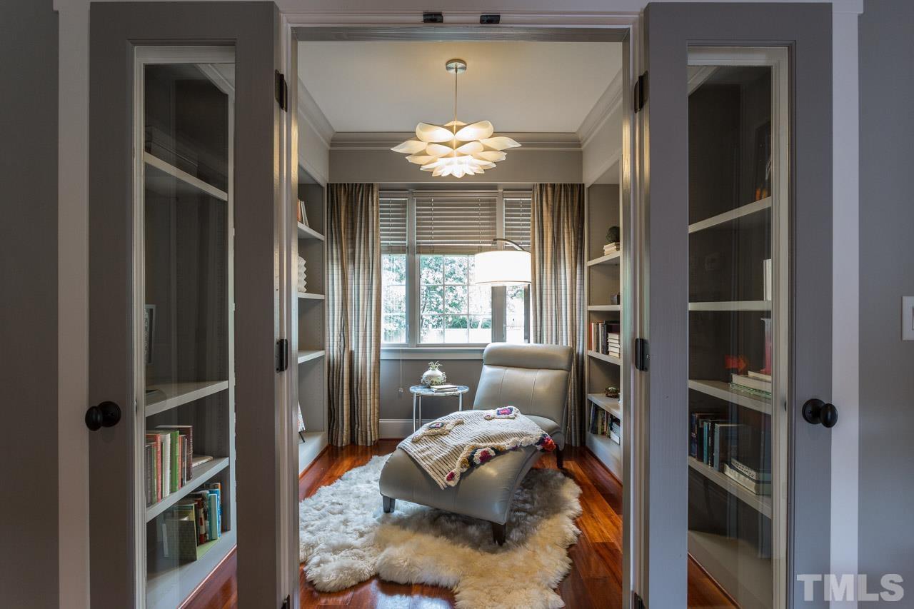 910 West Johnson Street Raleigh, NC 27605 - Photo 22 of 30 a bedroom with a bed and a window