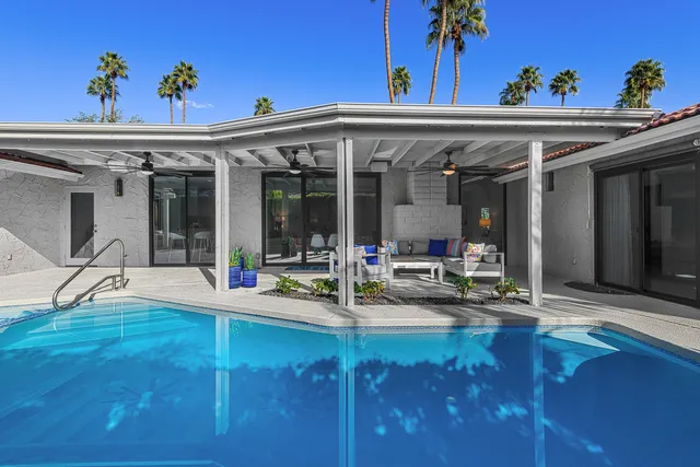 a view of a building with sitting area