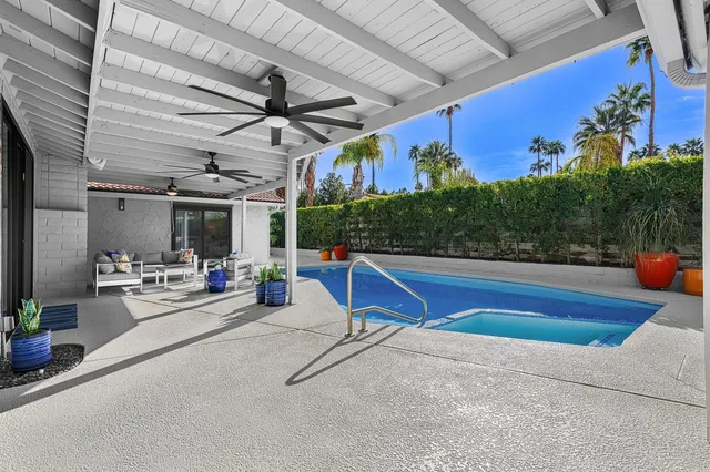 a view of a chairs and tables in patio