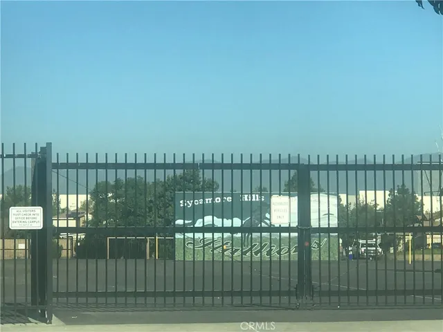 a view of a terrace with city green field