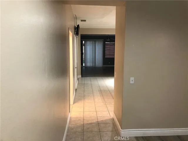 a view of hallway with shower