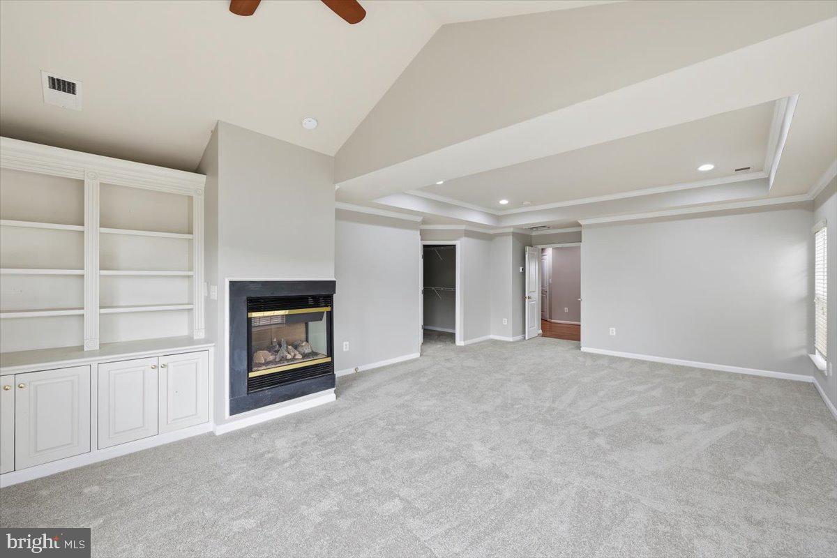 23706 Grapevine Ridge Terrace Clarksburg, MD 20871 - Photo 18 of 39 a view of empty room with a fireplace and cabinet