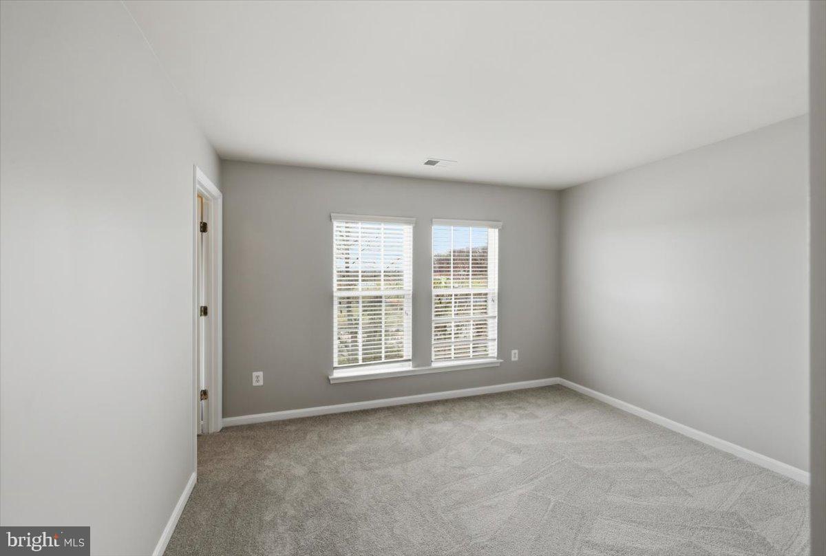 23706 Grapevine Ridge Terrace Clarksburg, MD 20871 - Photo 25 of 39 an empty room with a window