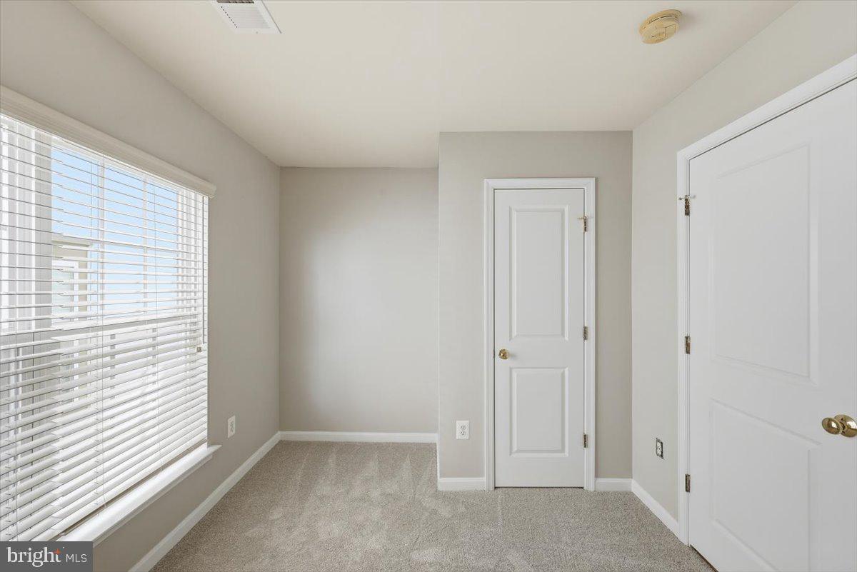 23706 Grapevine Ridge Terrace Clarksburg, MD 20871 - Photo 35 of 39 a view of an empty room with a window