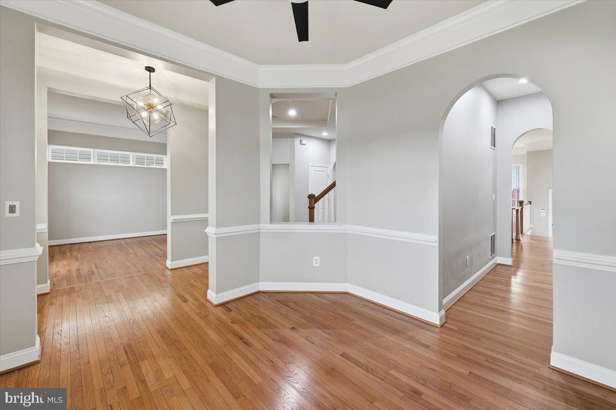 23706 Grapevine Ridge Terrace Clarksburg, MD 20871 - Photo 5 of 39 wooden floor in an empty room with a window