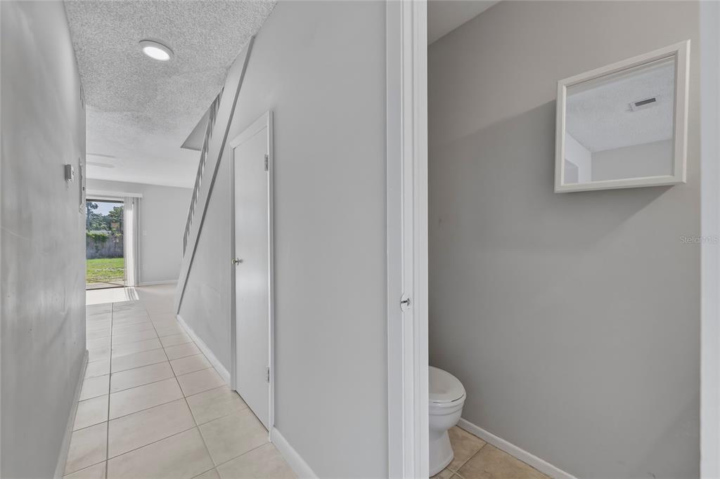 4799 Sisson Road Titusville, FL 32780 - Photo 8 of 23 a view of a hallway with toilet