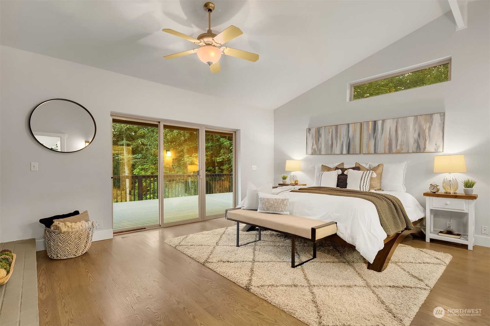 14741 209th Avenue Southeast Renton, WA 98059 - Photo 19 of 39 a spacious bedroom with a bed and a large window