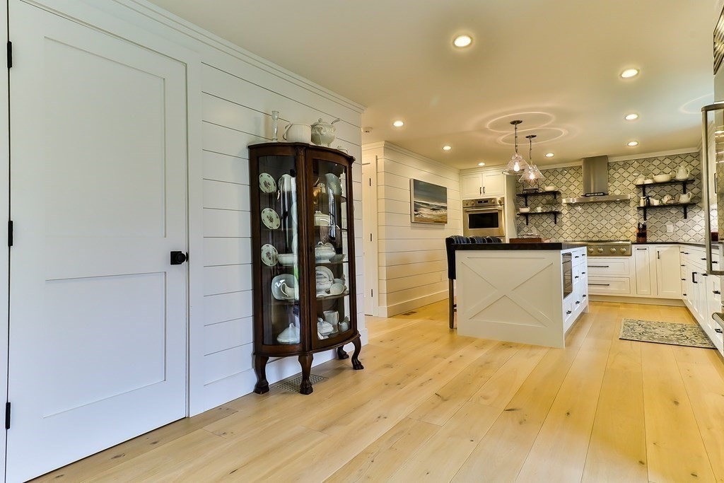36 Captain Baker Road Marstons Mills, MA 02648 - Photo 11 of 36 a view of a kitchen with stainless steel appliances kitchen island granite countertop a refrigerator and a sink