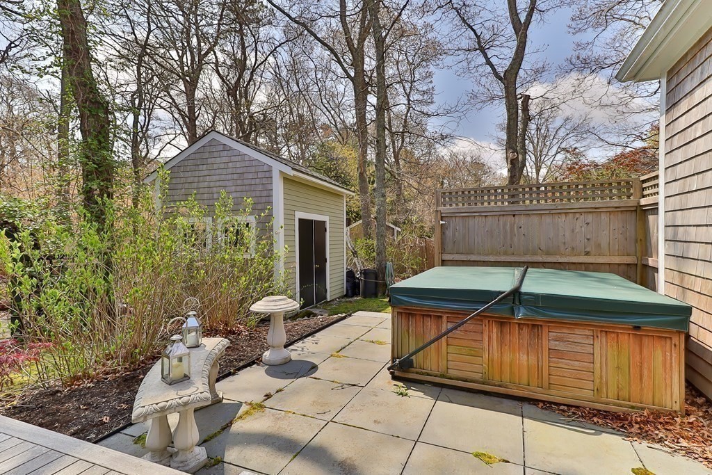 36 Captain Baker Road Marstons Mills, MA 02648 - Photo 29 of 36 a front view of a house with garden