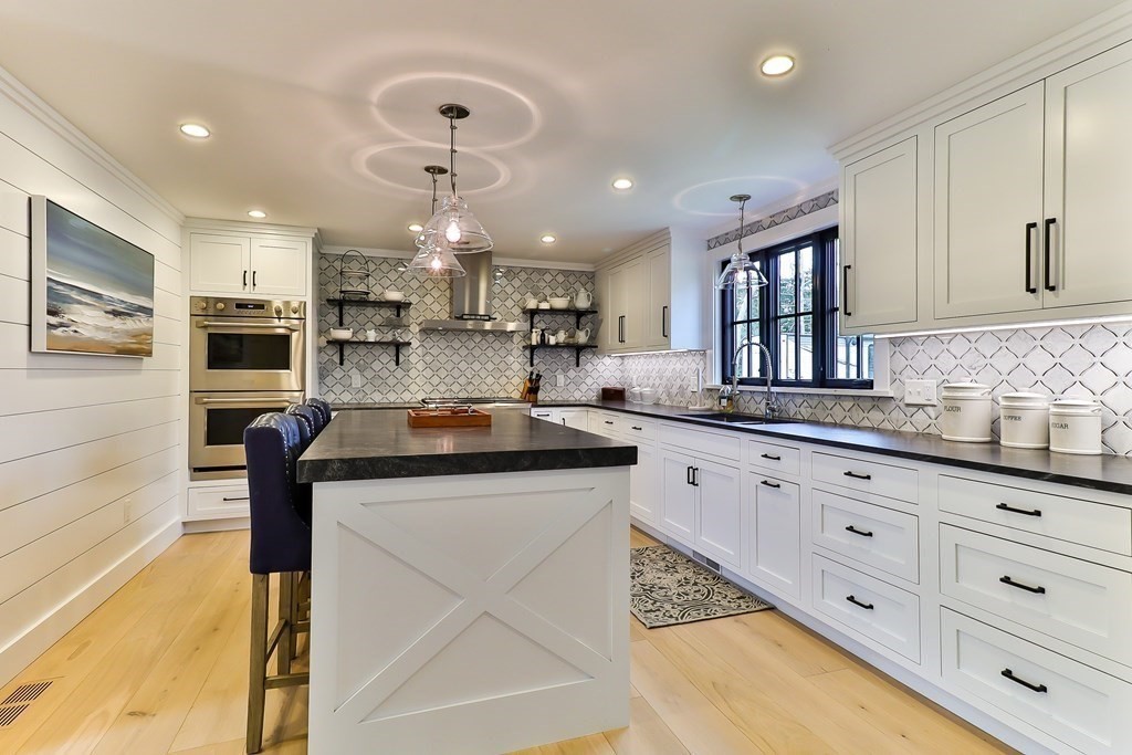 36 Captain Baker Road Marstons Mills, MA 02648 - Photo 3 of 36 a kitchen with stainless steel appliances granite countertop a sink and cabinets
