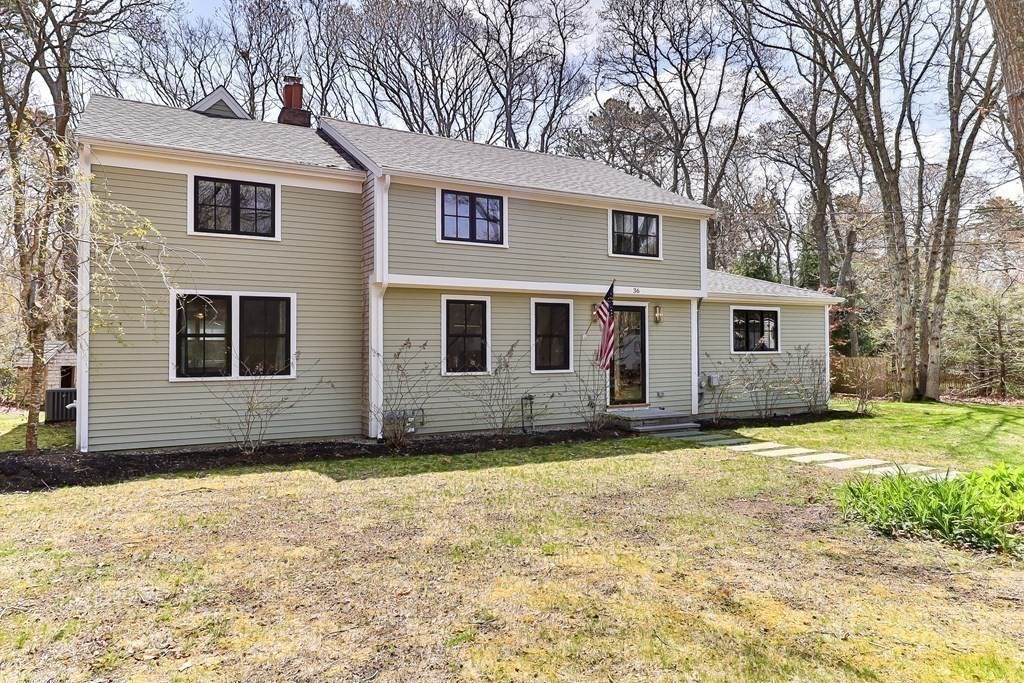 36 Captain Baker Road Marstons Mills, MA 02648 - Photo 34 of 36 a view of a house with a yard