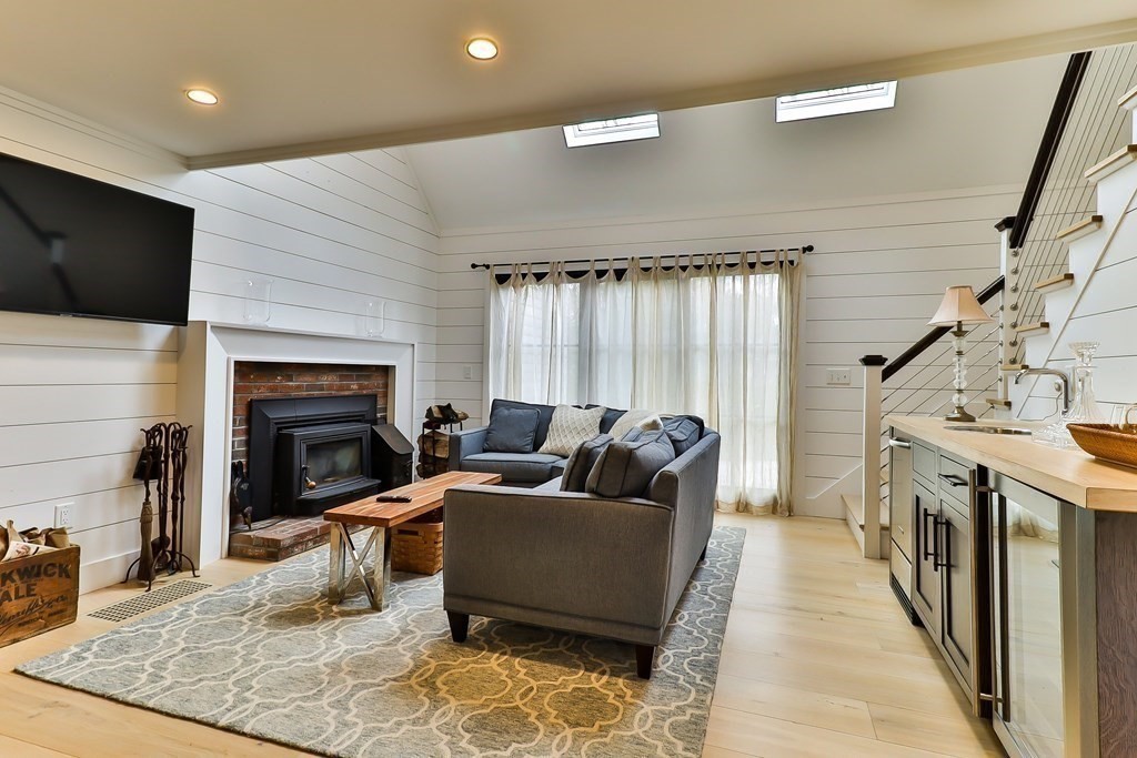 36 Captain Baker Road Marstons Mills, MA 02648 - Photo 7 of 36 a living room with furniture and a fireplace