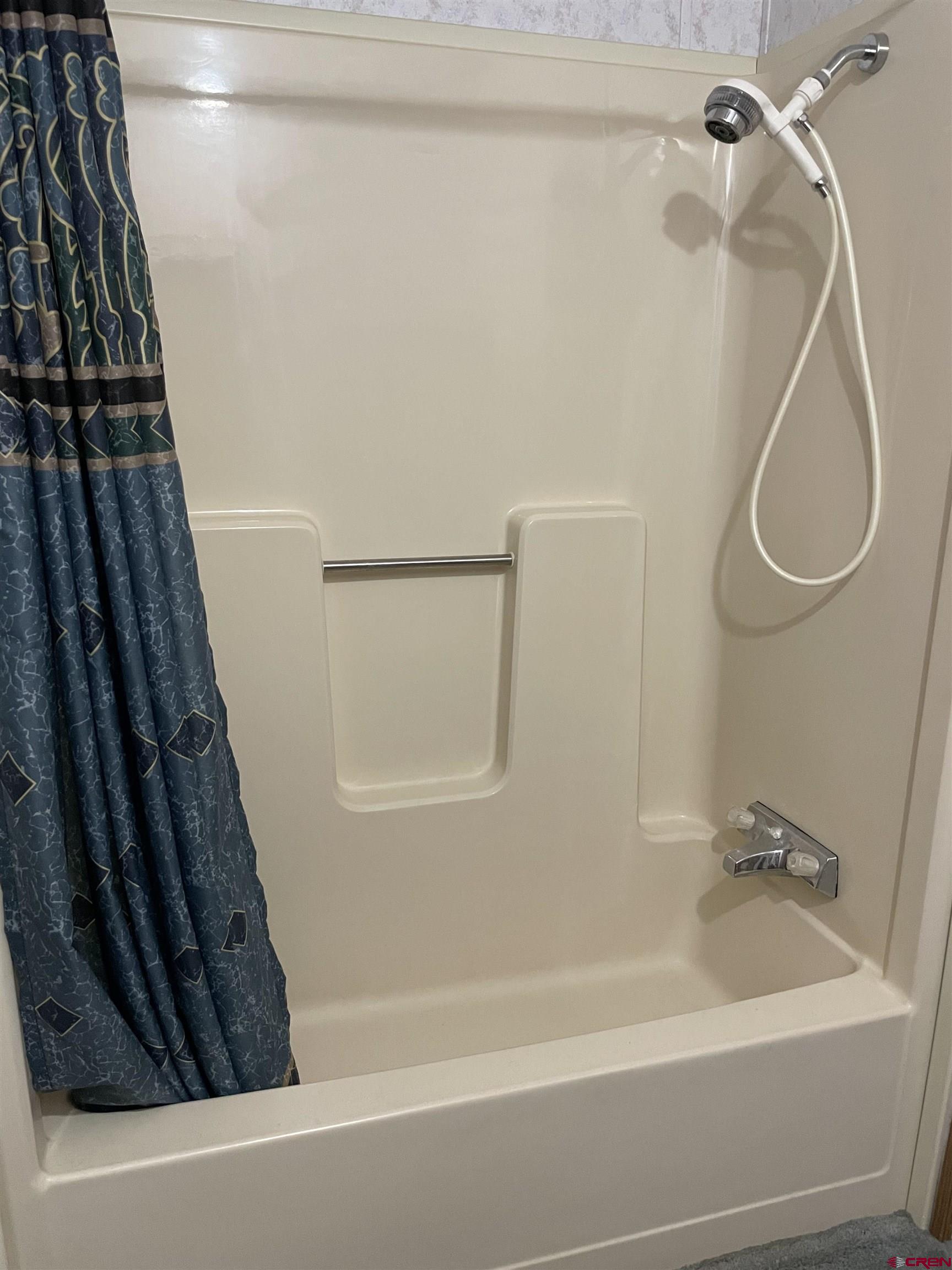 16022 B Road Delta, CO 81416 - Photo 18 of 35 a bathroom with a shower
