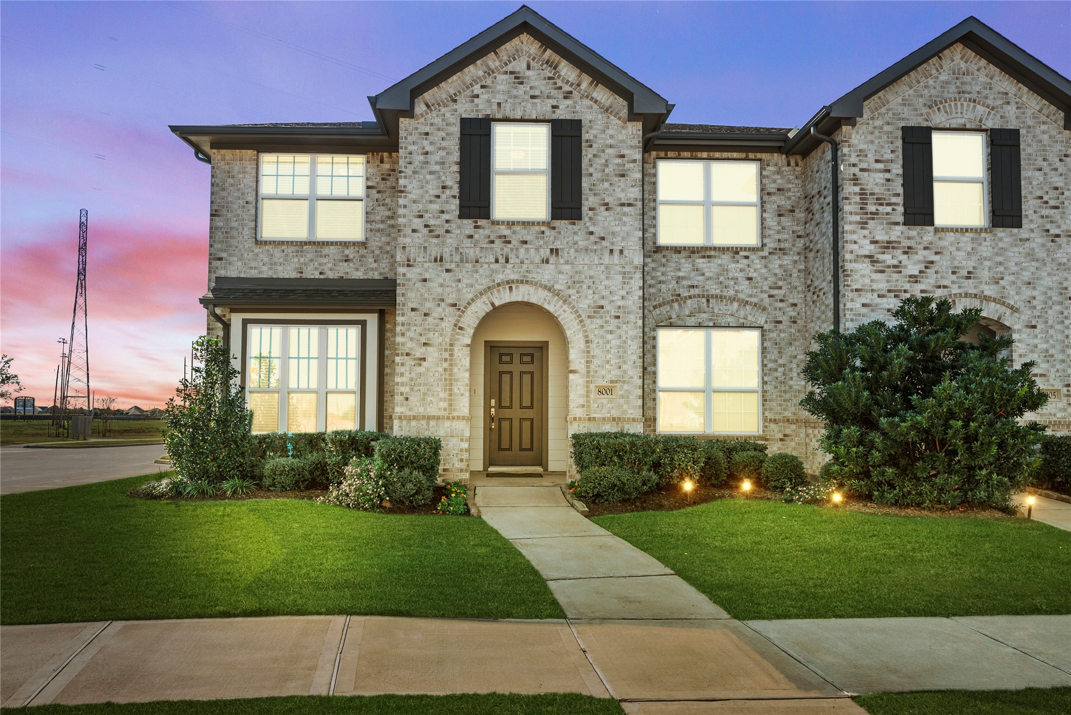 8001 Scanlan Trail Missouri City, TX 77459 - Photo 1 of 41 a front view of a house with garden