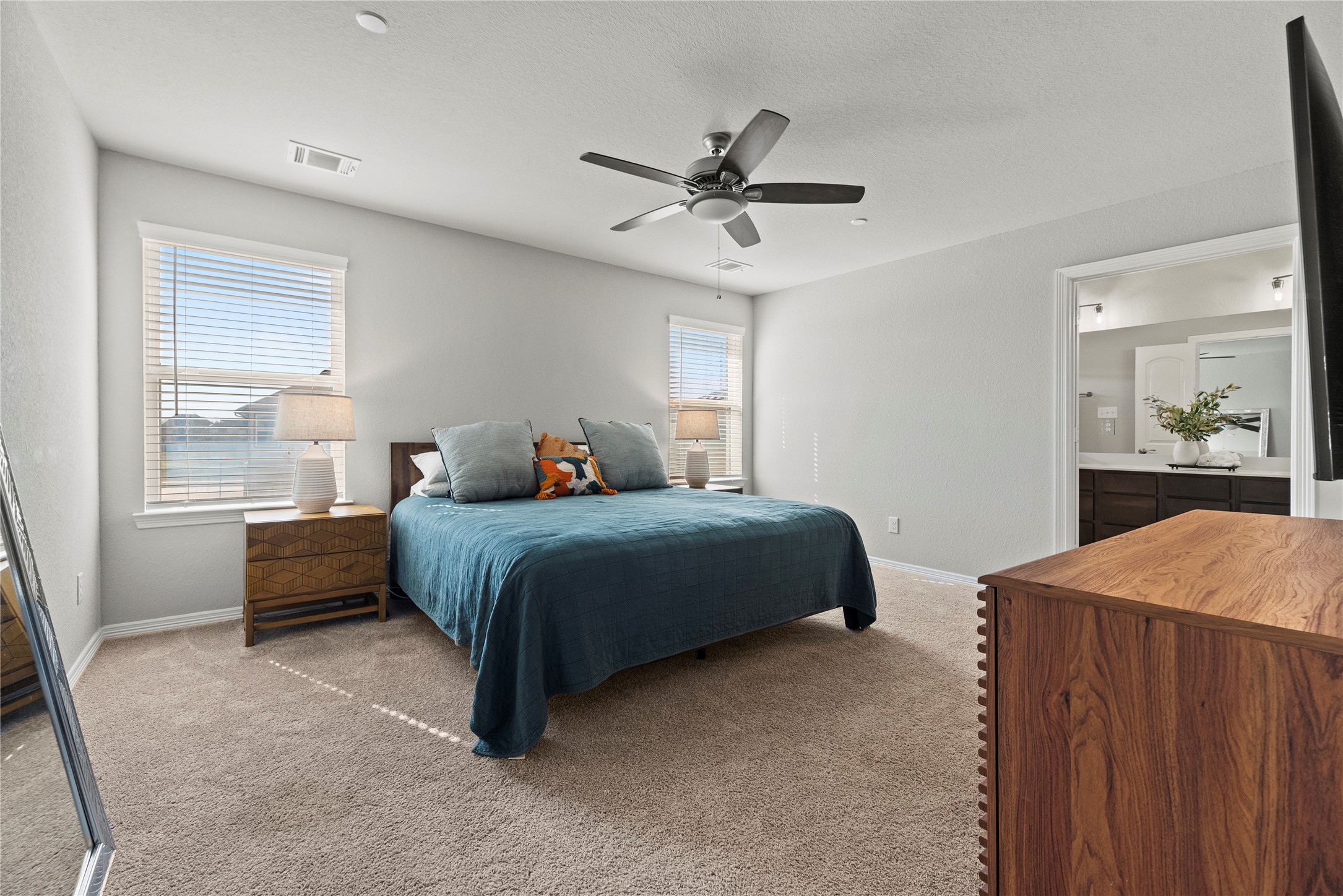 8001 Scanlan Trail Missouri City, TX 77459 - Photo 18 of 41 a bedroom with a bed and window