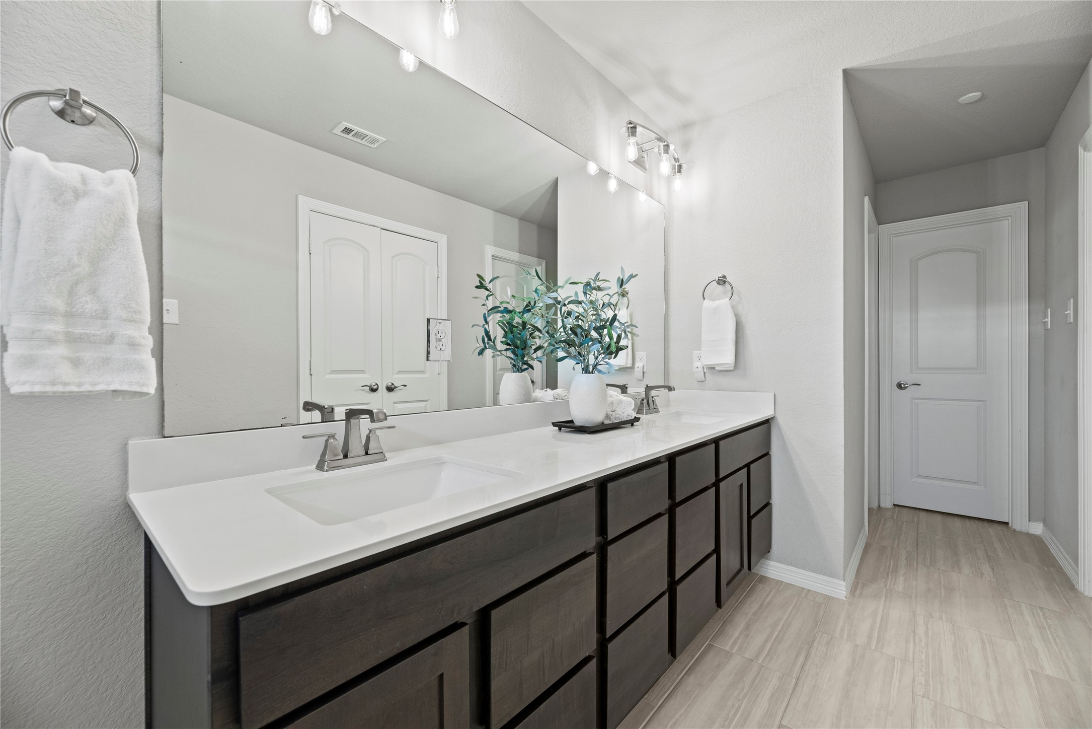 8001 Scanlan Trail Missouri City, TX 77459 - Photo 21 of 41 a bathroom with a sink double vanity and a mirror