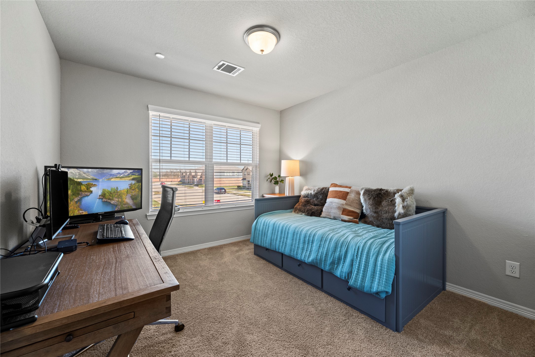 8001 Scanlan Trail Missouri City, TX 77459 - Photo 28 of 41 a bedroom with furniture and a window