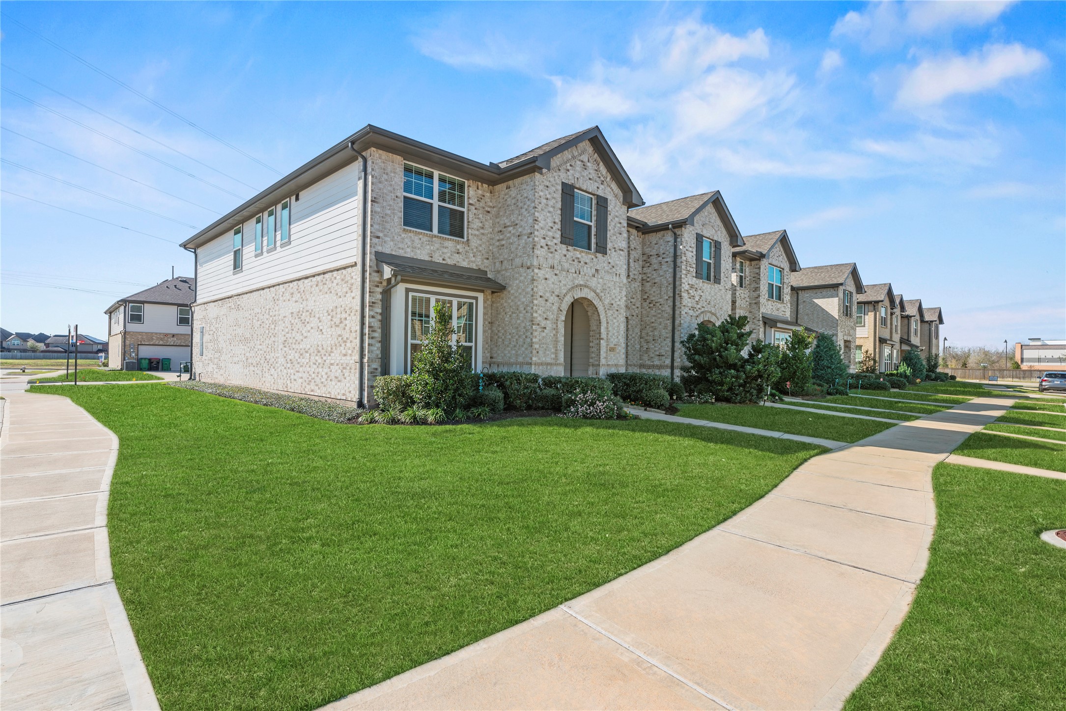 8001 Scanlan Trail Missouri City, TX 77459 - Photo 36 of 41 a front view of a house with garden
