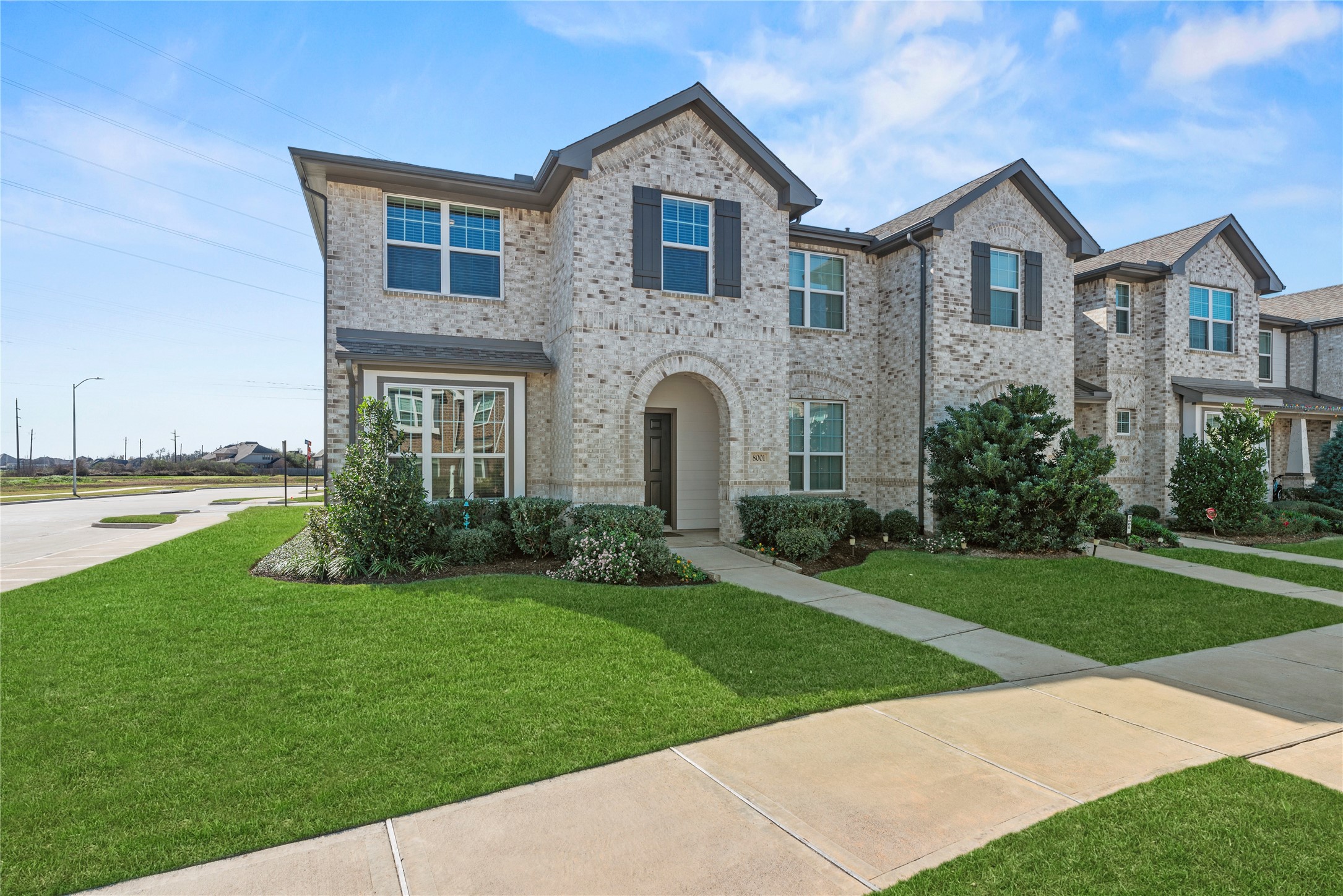 8001 Scanlan Trail Missouri City, TX 77459 - Photo 37 of 41 a front view of a house with garden