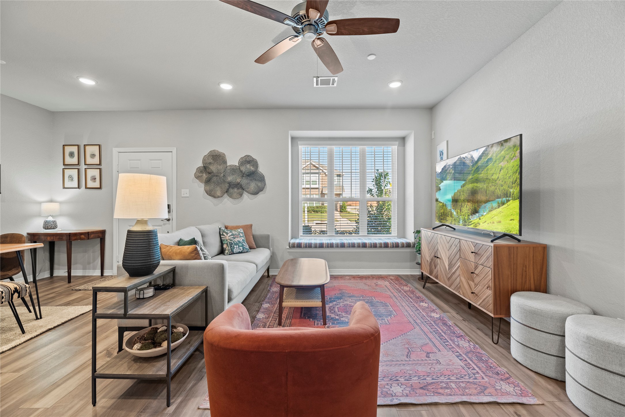 8001 Scanlan Trail Missouri City, TX 77459 - Photo 4 of 41 a living room with furniture and a flat screen tv
