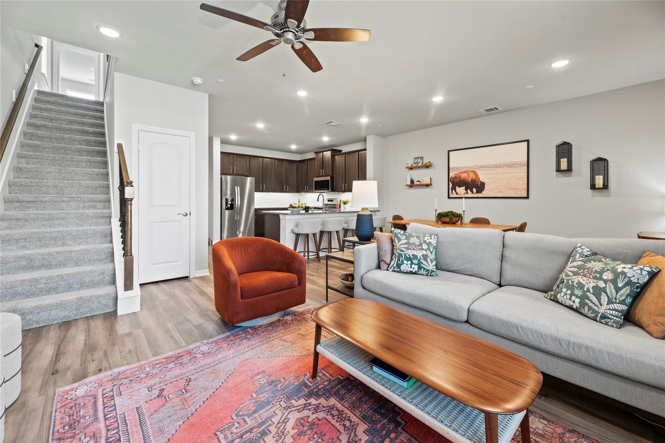 8001 Scanlan Trail Missouri City, TX 77459 - Photo 5 of 41 a living room with furniture and a wooden floor