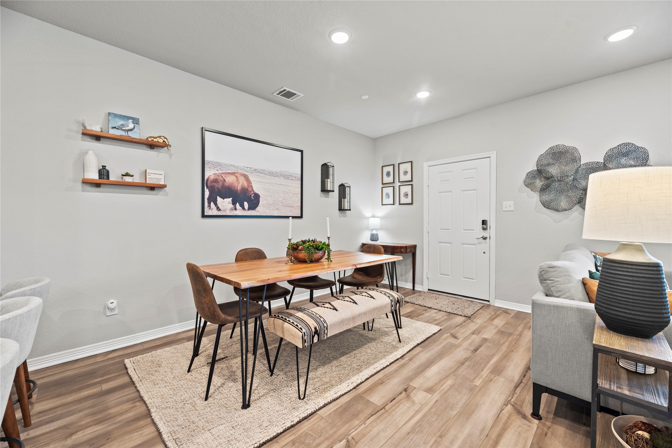 8001 Scanlan Trail Missouri City, TX 77459 - Photo 7 of 41 a living room with furniture a table and wooden floor
