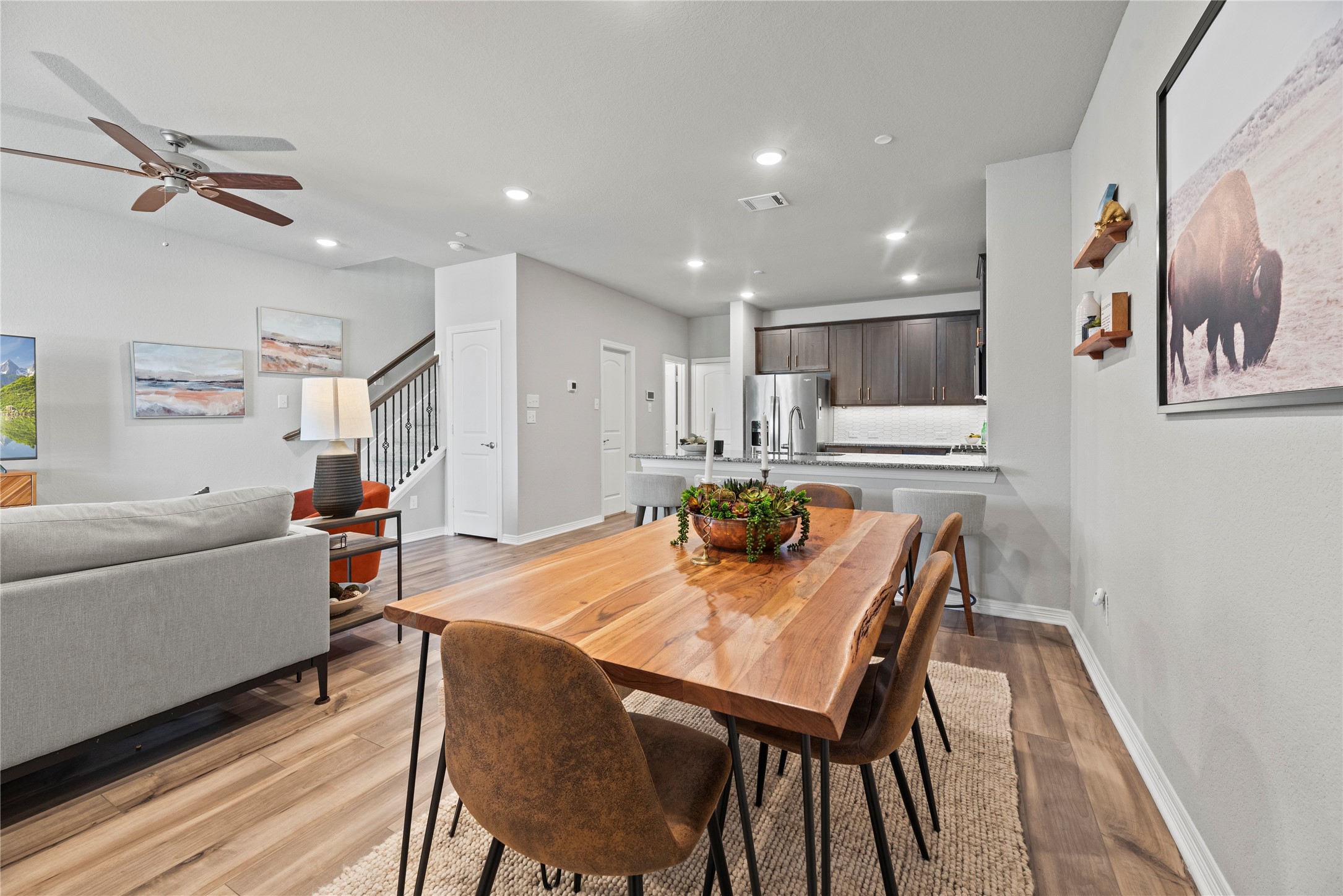 8001 Scanlan Trail Missouri City, TX 77459 - Photo 8 of 41 a living room with dining room and wooden floor