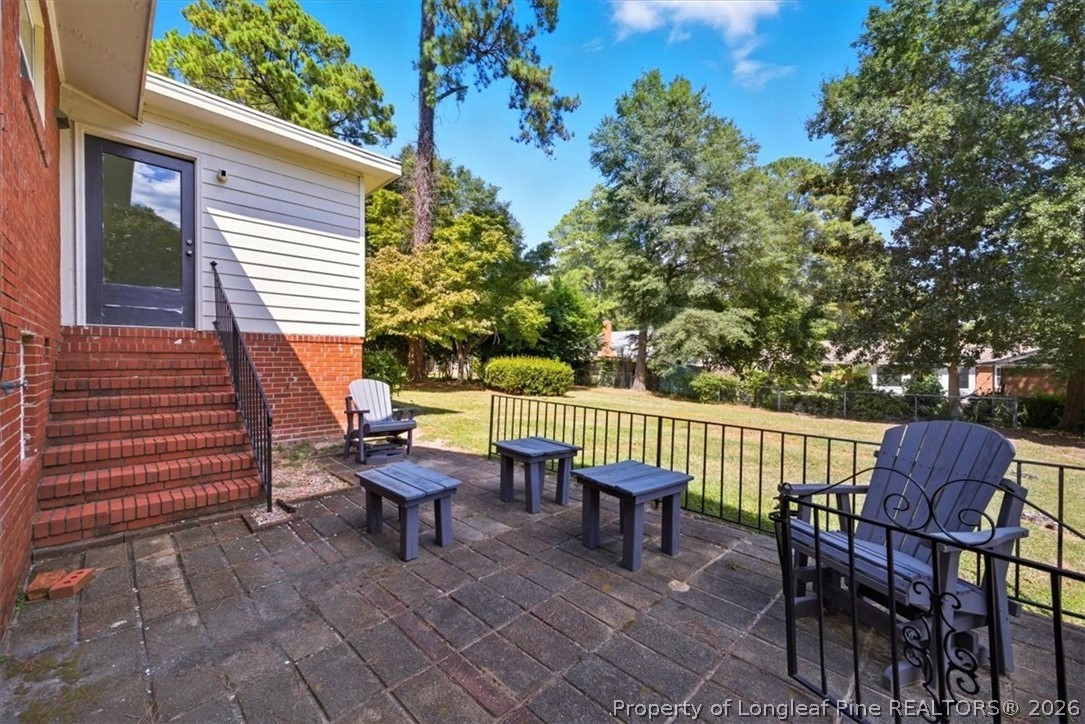 2604 Huntington Road Fayetteville, NC 28303 - Photo 37 of 46 a view of a two chairs in the patio